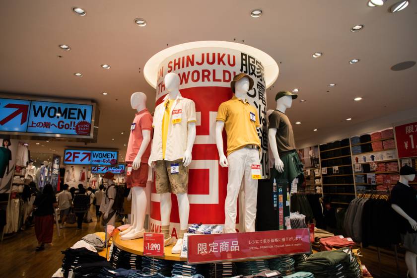How does Uniqlo Japan create an exquisite in-store environment?