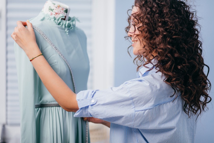 How can a pattern making book help develop a designer's skills?